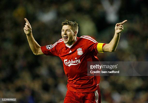 Steven Gerrard celebrates scoring his 100th goal for the Liverpool during the UEFA Champions League, Group D match between Liverpool and PSV...