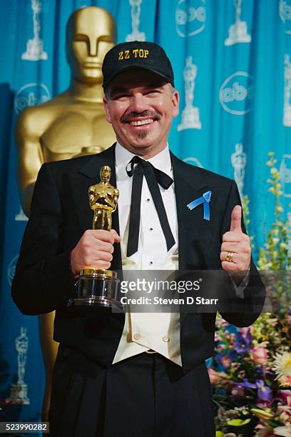 Winner of the Best Adapted Screenplay for his film Sling Blade, actor Billy Bob Thornton holds his Oscar backstage at the 69th annual Academy Awards.