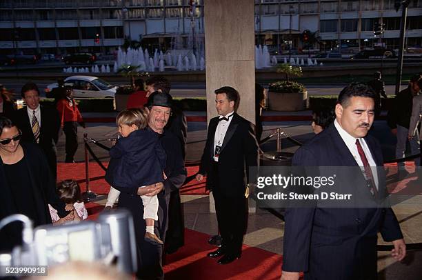 Robin Williams attends the opening night of the musical Beauty and the Beast with his wife Marsha Garces Williams and their children, Zelda and Cody....