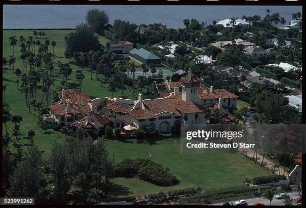 The Mar-a-Lago Estate, owned by Donald Trump, lies at the water's edge in Palm Beach, Florida. The mansion was built by Marjorie Merriweather Post in...