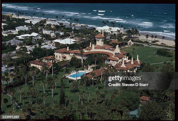 The Mar-a-Lago Estate, owned by Donald Trump, lies at the water's edge in Palm Beach, Florida. The mansion was built by Marjorie Merriweather Post in...