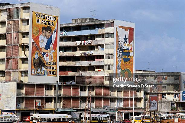 Large murals in a Panama neighborhood sport anti-American messages and promote Panamanian nationalism. The United States invaded Panama in 1989 to...