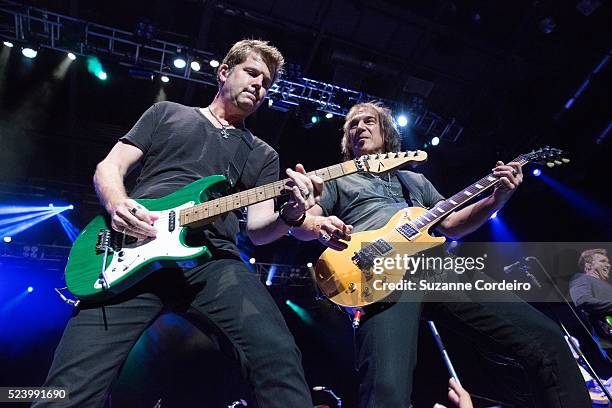 Keith Howland of Chicago and Dave Amato of REO Speedwagon perform in concert at Cedar Park Center on August 27, 2014 in Cedar Park, Texas.