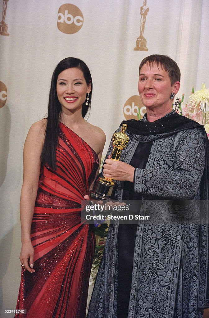 Costume Designer Lindy Hemming with Lucy Liu at 2000 Oscars