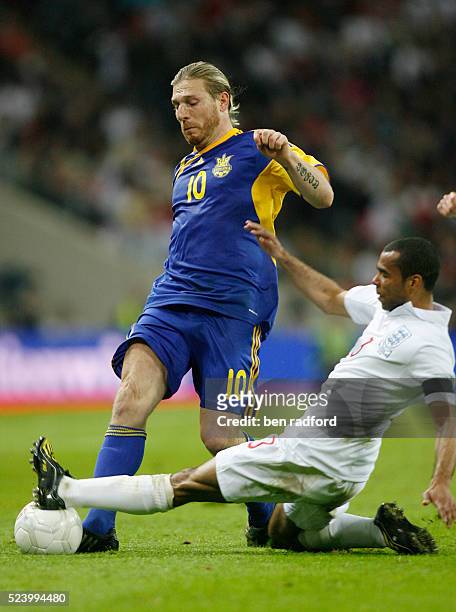 Ashley Cole of England and Andriy Voronin of Ukraine during the Group Six, FIFA 2010 World Cup qualifying match between England and Ukraine at...