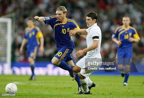 Gareth Barry of England and Andriy Voronin of Ukraine during the Group Six, FIFA 2010 World Cup qualifying match between England and Ukraine at...