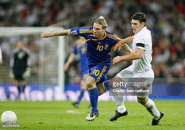 Gareth Barry of England and Andriy Voronin of Ukraine during the Group Six, FIFA 2010 World Cup qualifying match between England and Ukraine at...