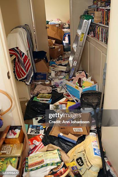Hallway between bedrooms is photographed in hoarder Laurel McCarthy's town-home in Yorba Linda, March 6, 2013.