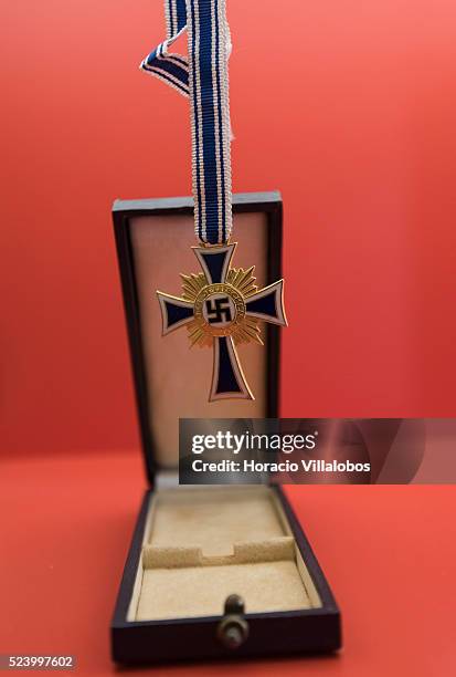 Nazi Cross of Honor of the German Mother, conferred by the government of the German Reich from 1939 until 1945 to mothers who exhibited probity,...