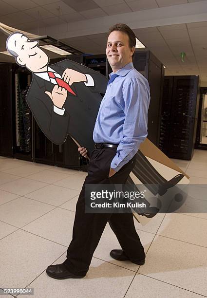 Steve Berkowitz carries his trademark butler icon through the server room as Ask Jeeves moves into their new corporate headquarters in downtown...