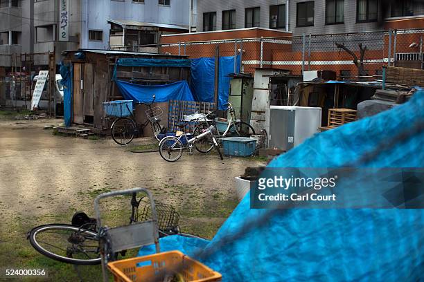 Shacks are pictured in the slum area of Kamagasaki on April 23, 2016 in Osaka, Japan. Kamagasaki, a district in Japan's second largest city Osaka, is...