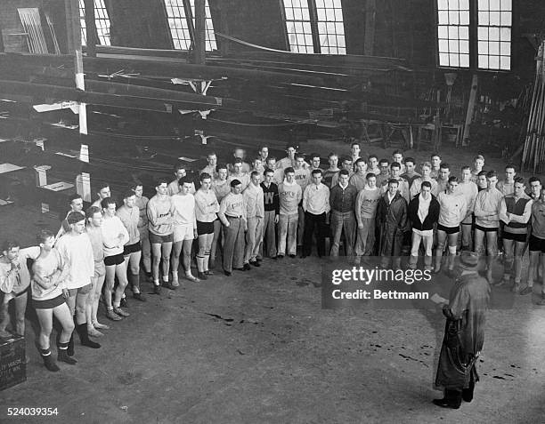 Coach Al Ulbrickson, rowing coach of the University of Washington, addressing the fifty men from whom he hopes to fashion a varsity eight that will...