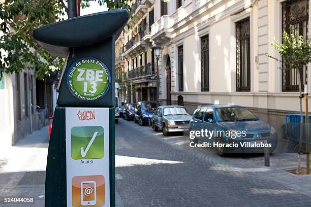 Parking meter in Barrio de las Letras, Madrid, Spain, 13 September 2013. Barrio de las Letras, is a neighborhood west of Paseo del Prado, famous for...