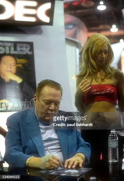 Larry Flynt, founder of Hustler Magazine, speaks to fans and signs autographs at the 2006 Adult Entertainment Expo, Las Vegas, Nevada.