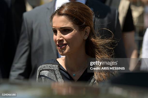 Queen Rania of Jordan leaves the refugee site of Kara Tepe in Mytilene on April 25, 2016. Jordan's Queen Rania today called for "legal" paths into...