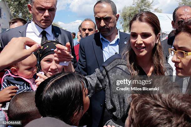 APRIl 25: Queen Rania of Jordan meets Syrian refuges at the Karatepe municipality camp for refugees on the outskirts of Mytilene, on April 25, 2016...