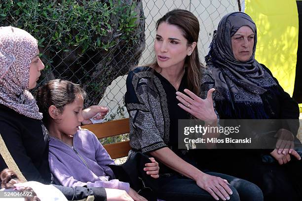 APRIl 25: Queen Rania of Jordan meets Syrian refuges at the Karatepe municipality camp for refugees on the outskirts of Mytilene, on April 25, 2016...