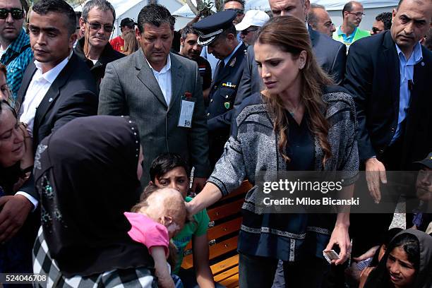 APRIl 25: Queen Rania of Jordan meets Syrian refuges at the Karatepe municipality camp for refugees on the outskirts of Mytilene, on April 25, 2016...