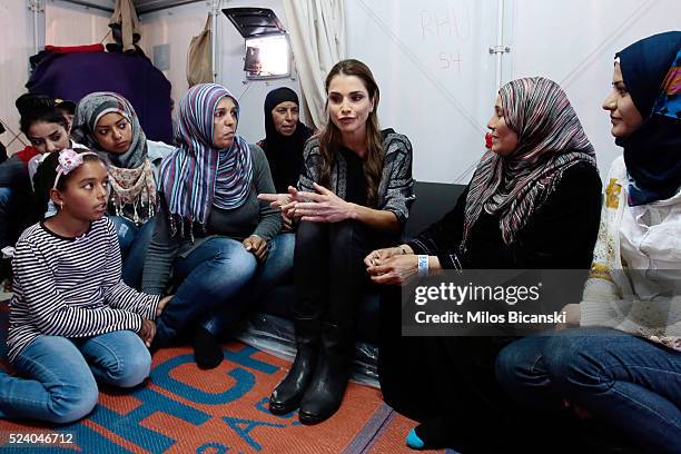 APRIl 25: Queen Rania of Jordan meets Syrian refuges at the Karatepe municipality camp for refugees on the outskirts of Mytilene, on April 25, 2016...