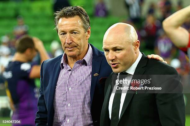 Craig Bellamy coach of the Storm and Andrew McFadden coach of the Warriors look on during the round eight NRL match between the Melbourne Storm and...