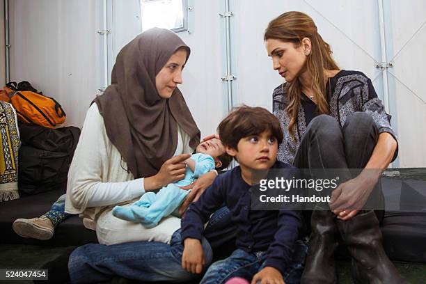 APRIl 25: In this handout image supplied by the Office of Her Majesty Queen Rania Al Abdullah, Royal Hashemite Court, Queen Rania of Jordan meets...