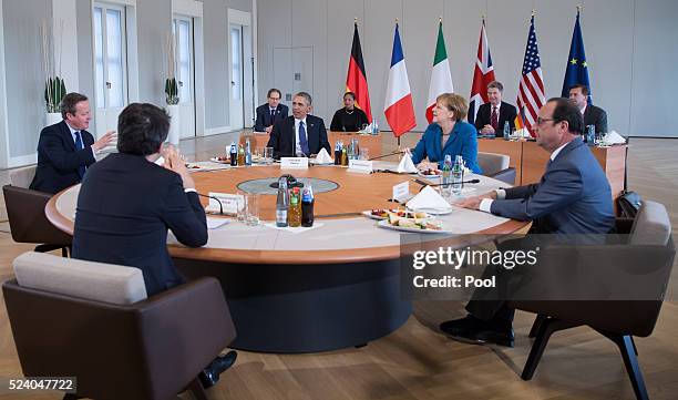 German Chancellor Angela Merkel meets with U.S. President Barack Obama, French President Francois Hollande, British Prime Minister David Cameron and...