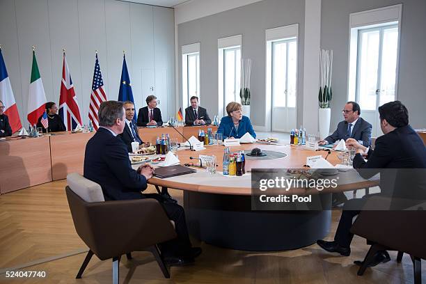 German Chancellor Angela Merkel meets with U.S. President Barack Obama, French President Francois Hollande, British Prime Minister David Cameron and...