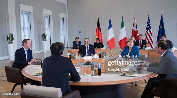 German Chancellor Angela Merkel meets with U.S. President Barack Obama, French President Francois Hollande, British Prime Minister David Cameron and...