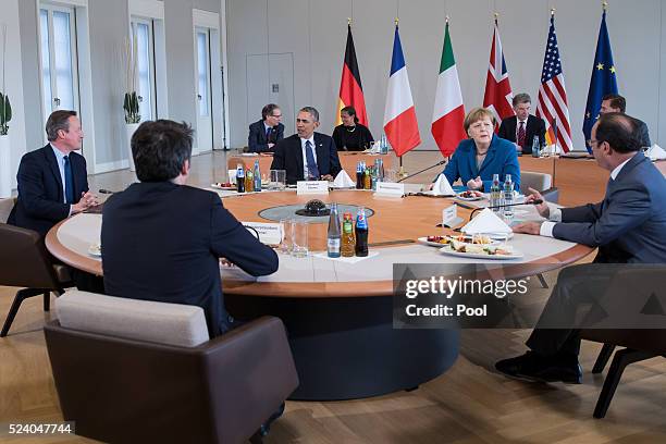 German Chancellor Angela Merkel meets with President Barack Obama,, British Prime Minister David Cameron , French President Francois Hollande and...