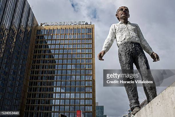 Stephan Balkenhol's sculpture 'Balancing Act' stands in front of Alex Springer building in Zimmerstrasse, Berlin, Germany, 14 April 2014. It was...