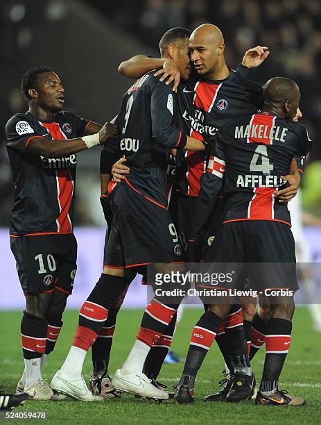 Sammy Traore and fellow PSG players celebrate during the French Ligue 1 soccer match between Paris Saint Germain and Valenciennes FC.
