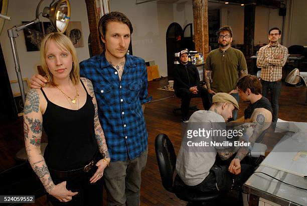 At the "Saved" tattoo parlour in Brookyn, New York, : Michelle Tarantelli, Scott Campbell, Miles Karr , John Reardon and Bailey Robinson, and Dan...