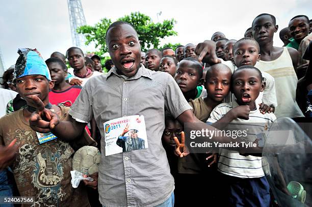 Supporters of the Union for Democracy and Social Progress led by Etienne Tshisekedi celebrating two days ahead of the presidental elections 2011 in...