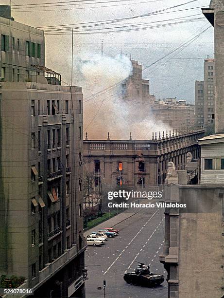 Chilean Presidential Palace La Moneda burns after rebel planes hit it with some 19 rockets, on September 11, 1973. The coup d'etat, headed by General...