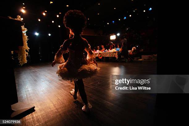 Age 8, performing her beauty walk during the Darling Divas Candy Land beauty pageant at the Kimble theatre in Brooklyn, New York on July 21, 2012...