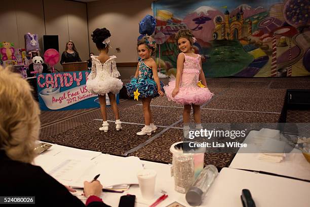 Contestants modeling in front of a panel of judges during the Angel Face Nationals in the Holiday Inn in Liverpool, NY on October 27, 2012 Photo by...