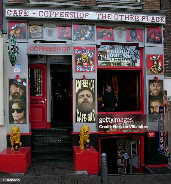 Tattoo parlor, and one of the many coffeeshops in Amsterdam where patrons can smoke marijuana.