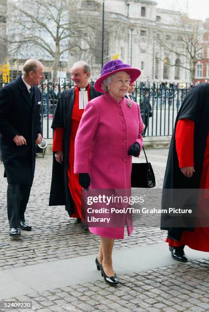 Britain's Queen Elizabeth II and Prince Philip arrive at an Observance for Commonwealth Day 2005 service held at Westminster Abbey in central London...