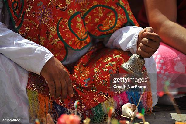 Preist performing ritual PUJA at the premises of Swayambhunath Stupa to initiate reconstruction work in Swayambhunath Stupa in Kathmandu, Nepal,...