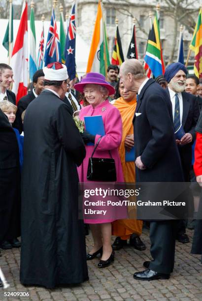 Britain's Queen Elizabeth II and Prince Philip arrive at an Observance for Commonwealth Day 2005 service held at Westminster Abbey in central London...