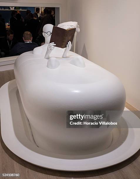 Dummy is placed in a foam overflowing bathtub to show the Foam Spa at Grohe pavilion in ISH trade fair, in Frankfurt, Germany, 11 March 2015. The ISH...