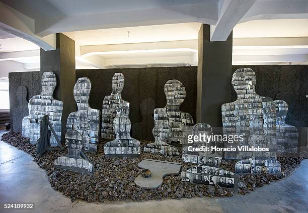 Silhouettes made of inmates' ID pictures at the camp exhibit in Buchenwald concentration camp near Weimar, Germany, 21 July 2013. The camp,...
