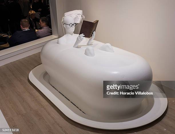 Dummy is placed in a foam overflowing bathtub to show the Foam Spa at Grohe pavilion in ISH trade fair, in Frankfurt, Germany, 11 March 2015. The ISH...