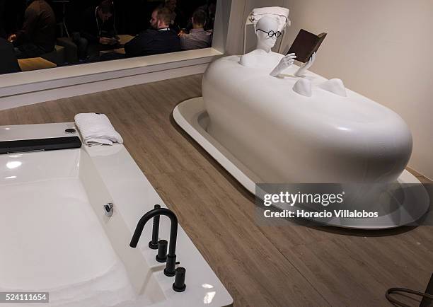 Dummy is placed in a foam overflowing bathtub to show the Foam Spa at Grohe pavilion in ISH trade fair, in Frankfurt, Germany, 11 March 2015. The ISH...