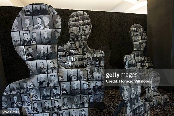 Silhouettes made of inmates' ID pictures at the camp exhibit in Buchenwald concentration camp near Weimar, Germany, 21 July 2013. The camp,...