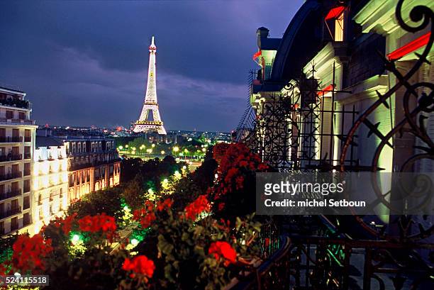 From the terrace of the Hotel Plaza Athenee guests enjoy a sweeping view of the Paris skyline and the Eiffel Tower.