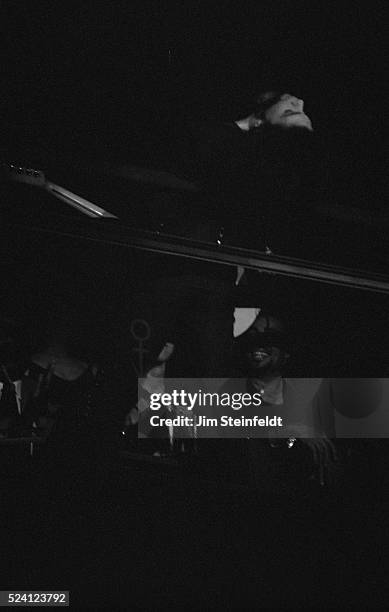 Prince performs leaning over the balcony at his Glam Slam nightclub in Minneapolis, Minnesota on January 6, 1991.