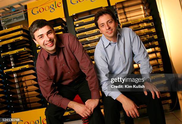 Larry Page , Co-Founder and President, Products and Sergey Brin, Co-Founder and President, Technology pose inside the server room at Google's campus...
