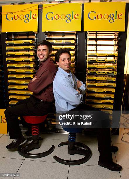 Larry Page , Co-Founder and President, Products and Sergey Brin, Co-Founder and President, Technology pose inside the server room at Google's campus...