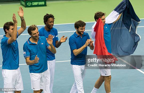 French team members jubilate at the end of the doubles played by Julien Benneteau and Nicolas Mahut against Benjamin Becker and Andre Begemann of...